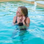 Why do my ears feel full after swimming?